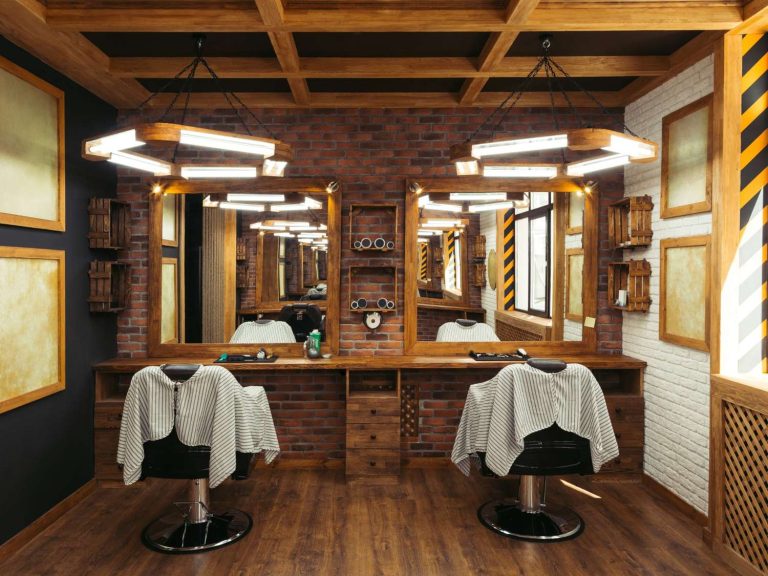 Stylish interior of the best barber shop with modern chairs, mirrors, brick walls, and sleek lighting for a premium experience.