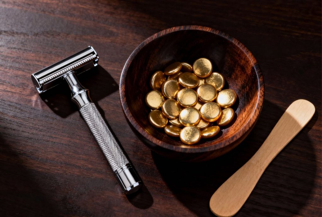 Premium hard wax pellets and safety razor ready for sharp beard line waxing and cleanup